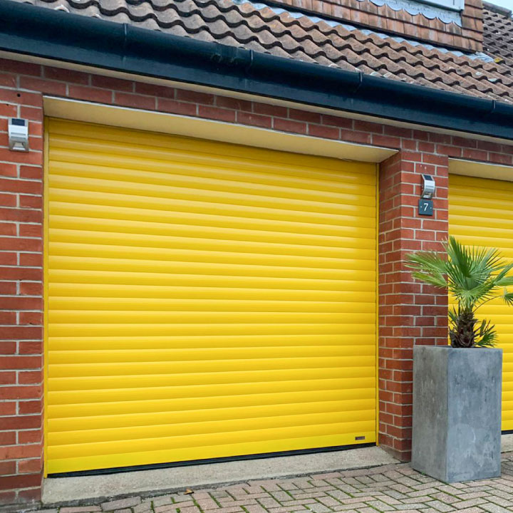 SeceuroGlide roller garage doors in yellow
