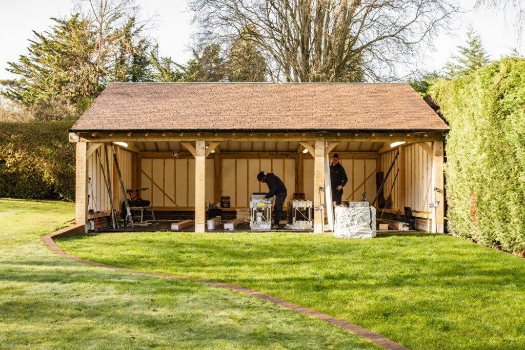 Installation of Hormann ART42 VItraplan sectional garage doors in black