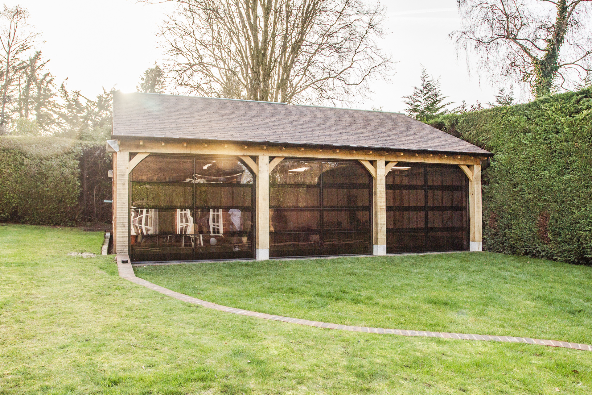 Installation of Hormann ART42 VItraplan sectional garage doors in black