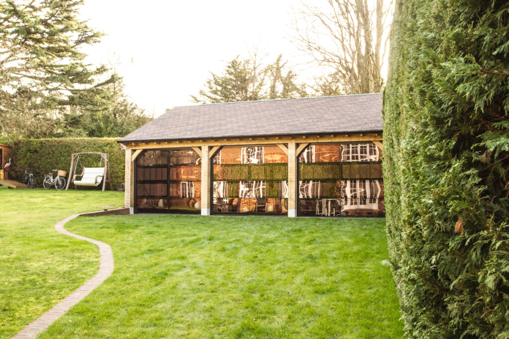 Installation of Hormann ART42 VItraplan sectional garage doors in black